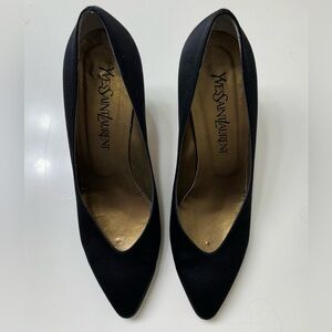 Beautiful Yves Saint Laurent black satin pumps. Rare find for this condition.